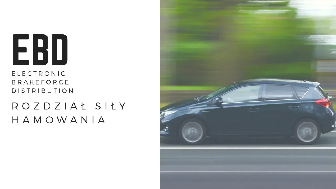 EBD - elektroniczny rozdział siły hamowania. Ciemny samochód w ruchu, zamazane tło.