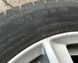 Opona radialna 185/55 R15 Tubeless. Widoczny rozmiar i oznaczenie radialnej konstrukcji.