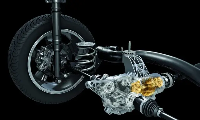 Przekładnia napędu 4x4 z widocznym mechanizmem i elementami zawieszenia.